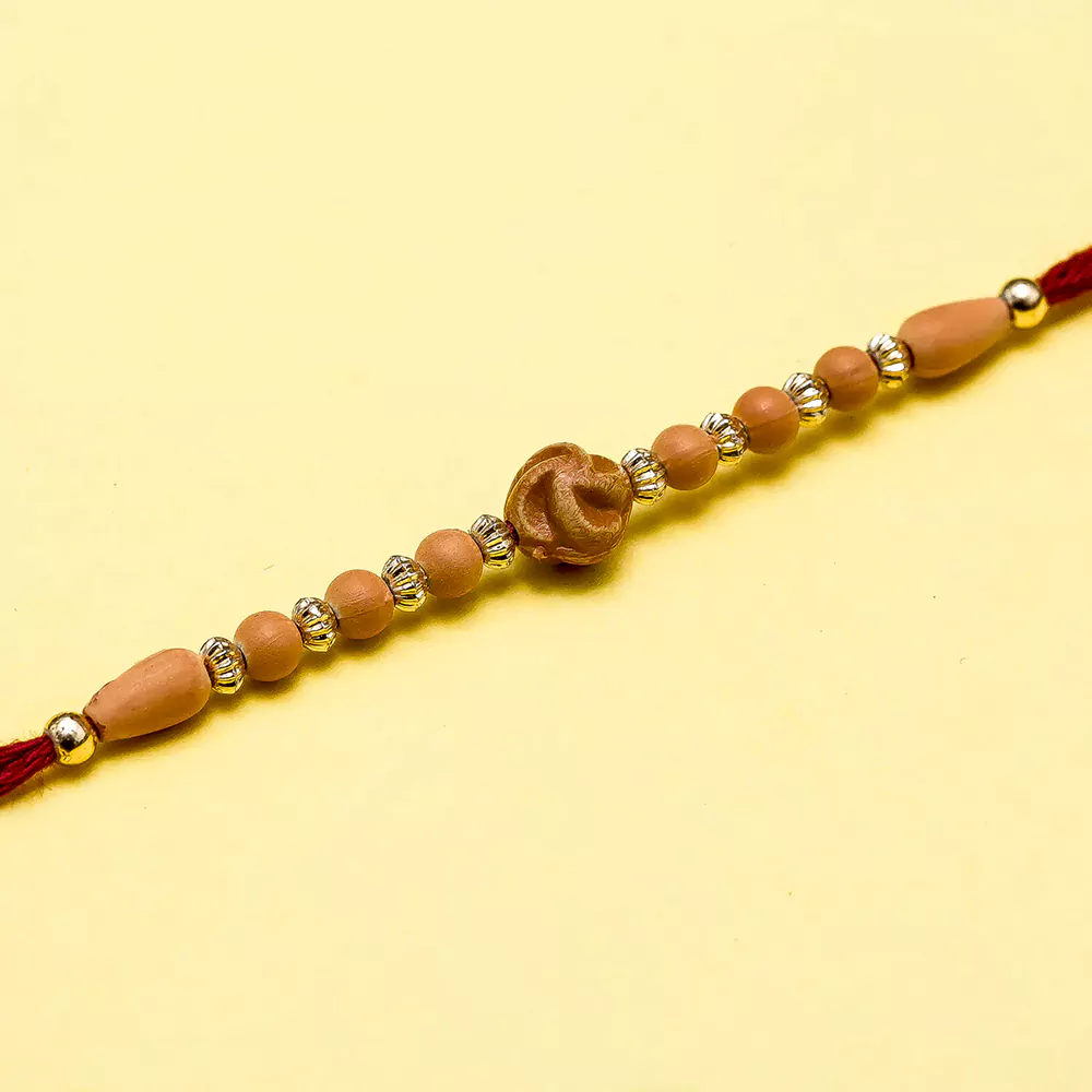 Beads symbol thread rakhi