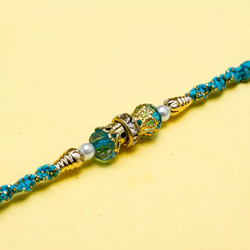 Handcrafted sky blue thread rakhi