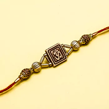 golden om rudraksha rakhi