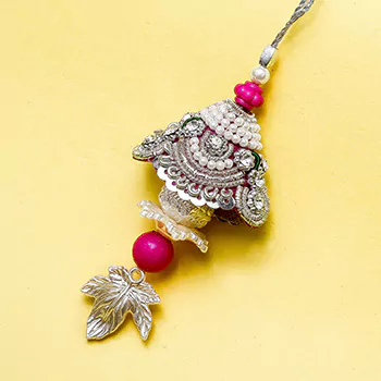 Pink pearl moment lumba rakhi